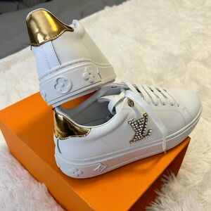 Louis Vuitton Unisex gold sneakers Womens US12 / Mens US10